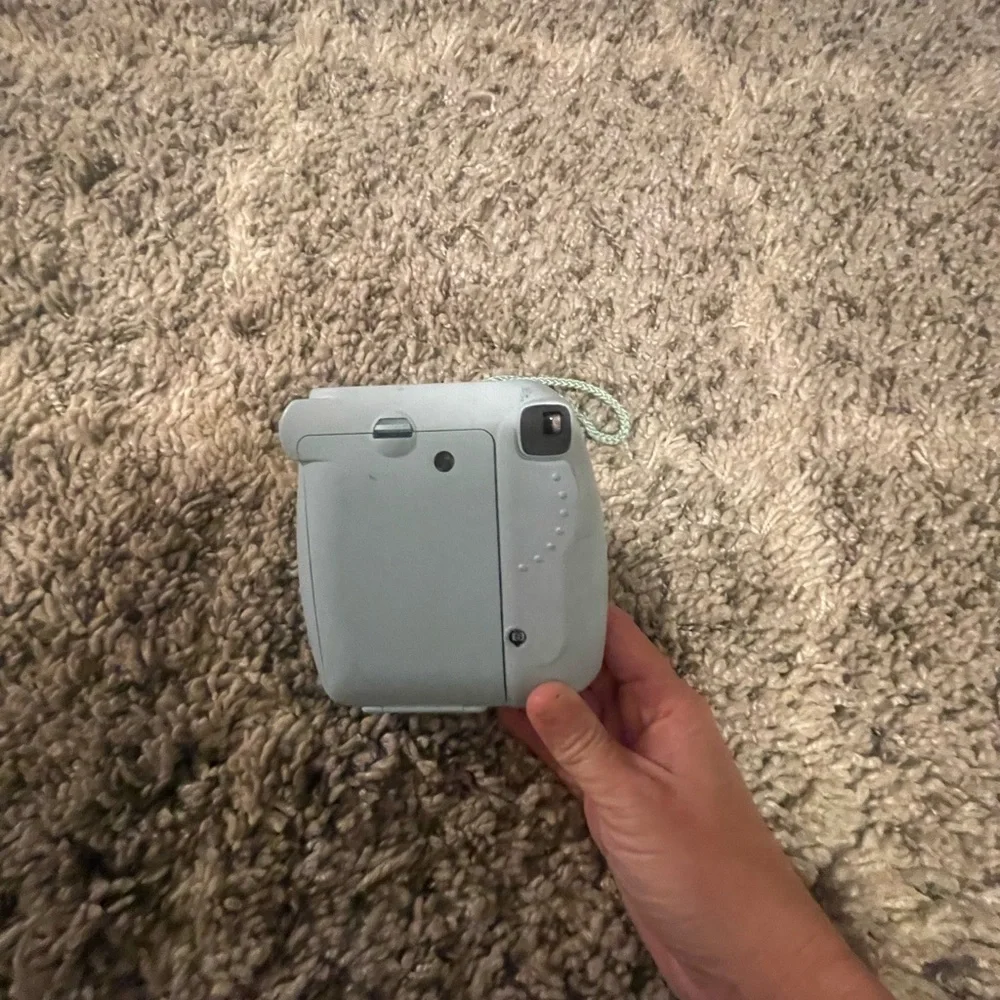Fujifilm instax mini 8 lens 60mm, focus range 0.6m. Instant print